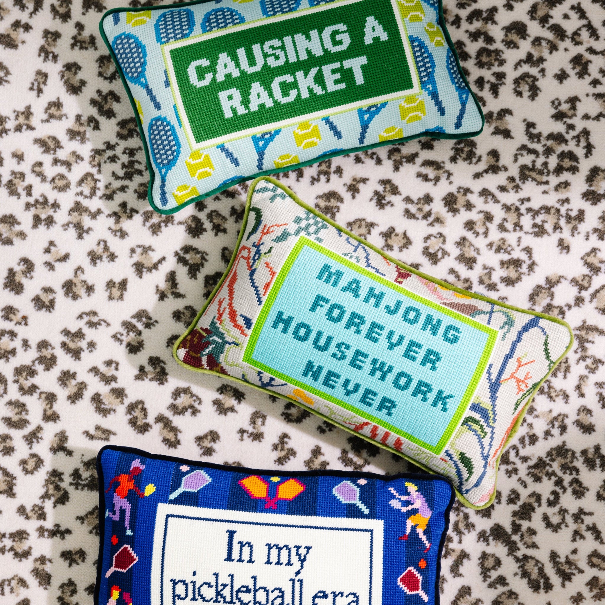 Causing A Racket Needlepoint Pillow