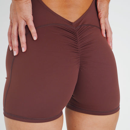 I am Limitless Front Zip Zip Bodysuit in Chocolate