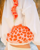 The Arnoldi Peachpuff Clutch Bag In Orange & Peach