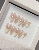 Set of beige nail art designs in a box