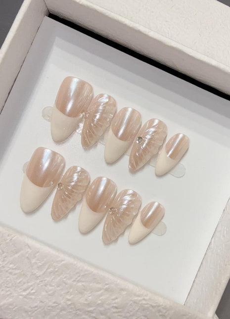 Set of beige nail art designs in a box